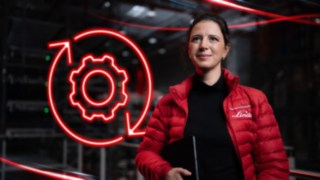 Linde Material Handlingu töötaja laos ja taustal on punane LED-sümbol hammasrattast.